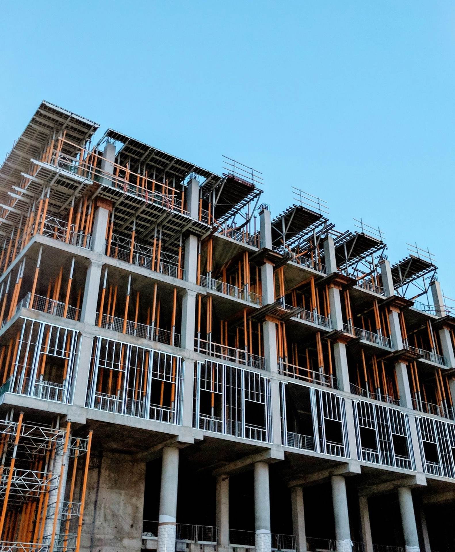 The steel frame of a multi-storey building under construction